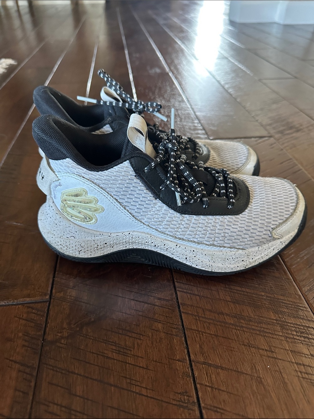 Under Armour Kids White and Black Sneakers with Gold Logo